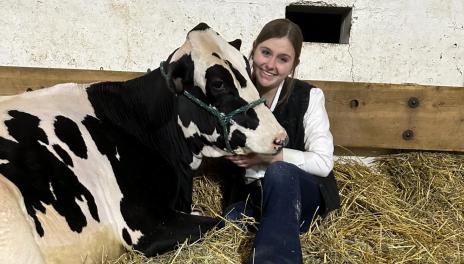Keyahna Musland with dairy cow