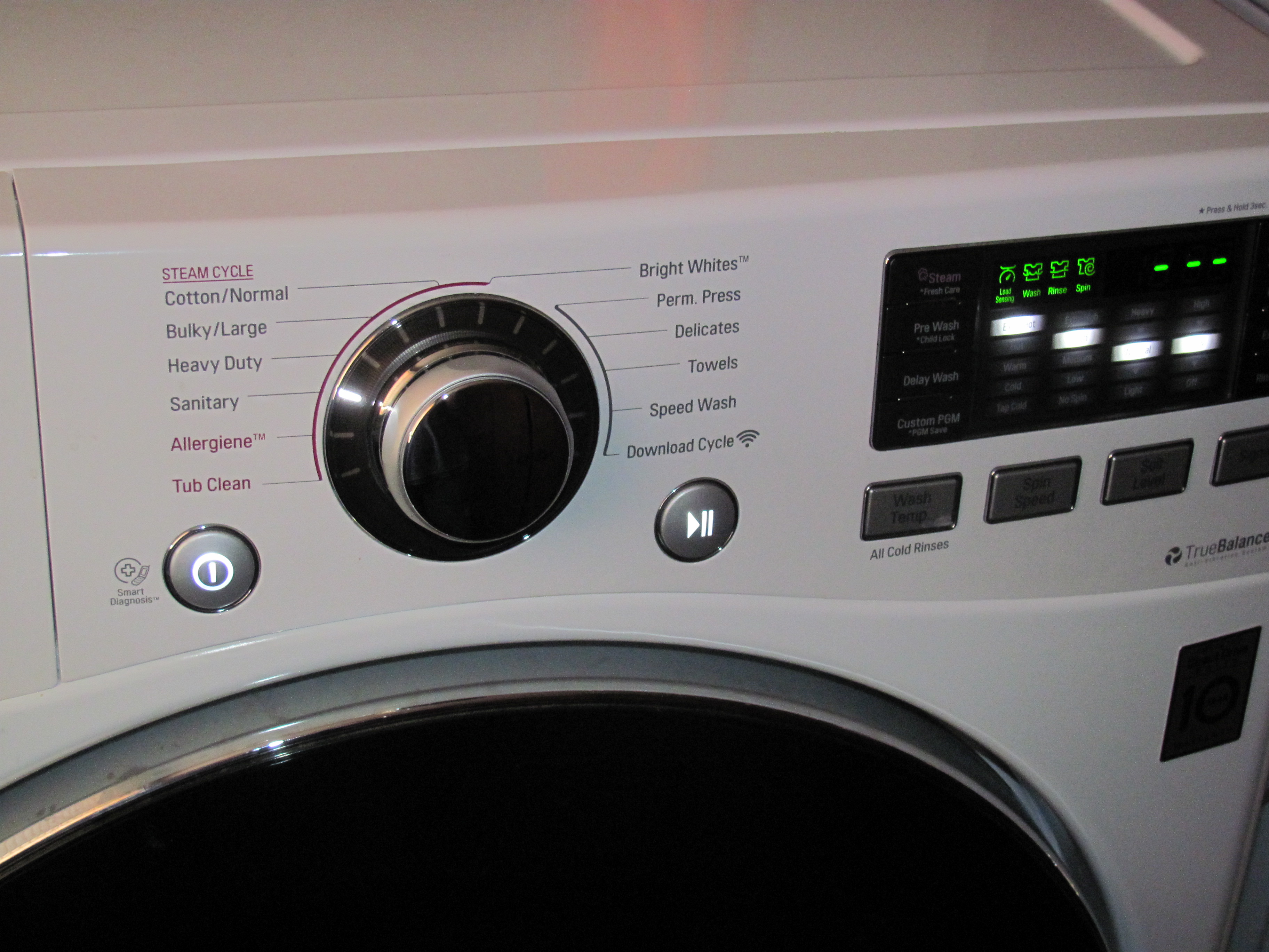 close up of washing machine cylcles