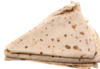 Several shees of lefse folded into triangles and stacked on one another