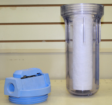 clear water filter casing with filter in it