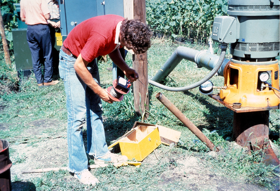Man working with an irrigation system