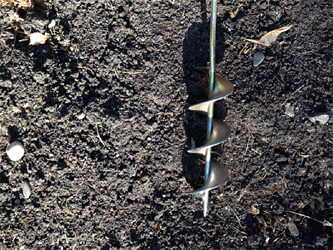 Figure 3. A 3-inch bulb auger attaches to an electric drill and can be used to drill vertical pockets in the soil.