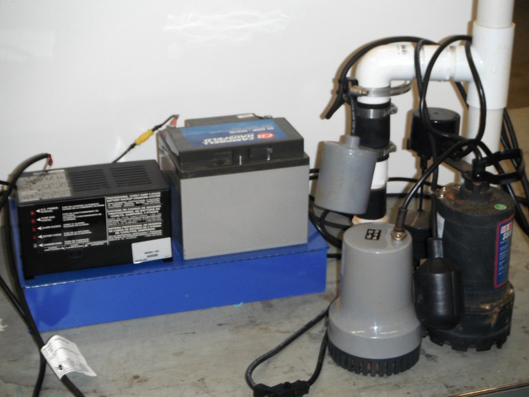 Figure 7. Charger and battery with the primary and backup pumps.