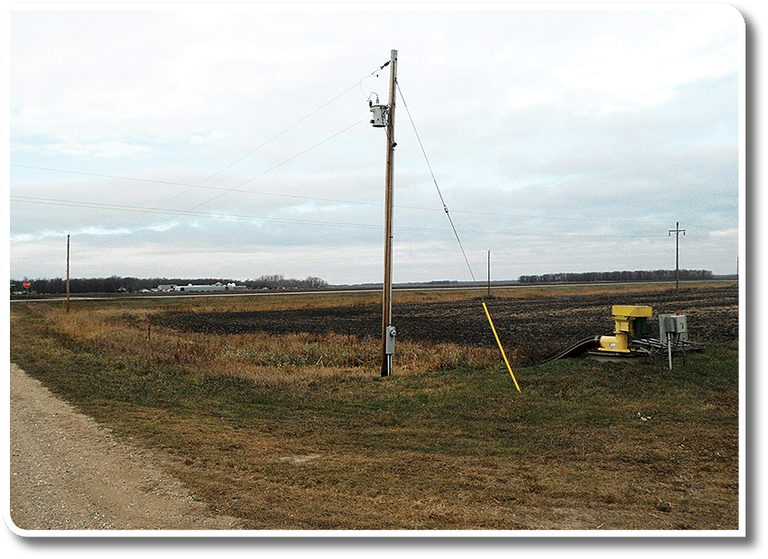 Figure 1. A tile drainage pump station is near power lines. 