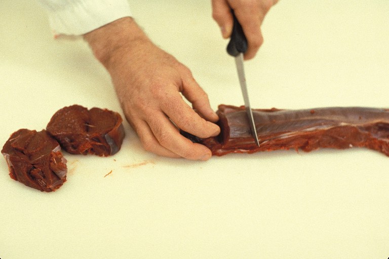Figure 10. Cutting butterfly steak.