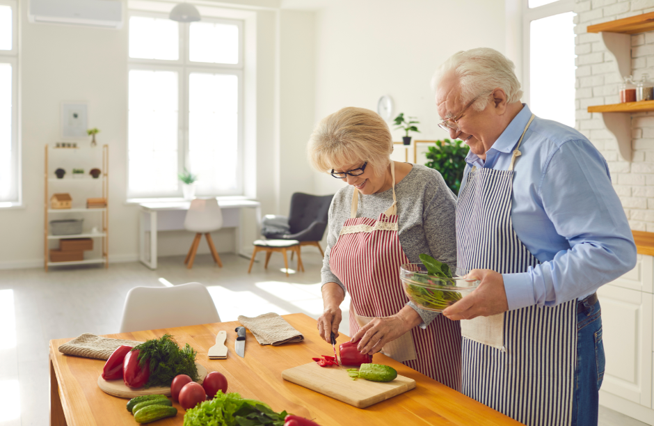 Elderly couple making a healthy meal