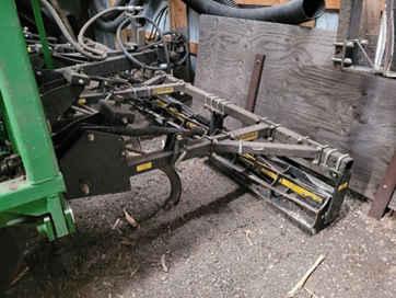 Figure 28.8 Anhydrous ammonia applicator using spike shanks and a rolling basket to cover the application trench. NDSU image