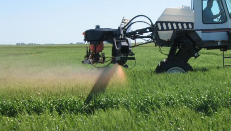 crop sprayer spraying field