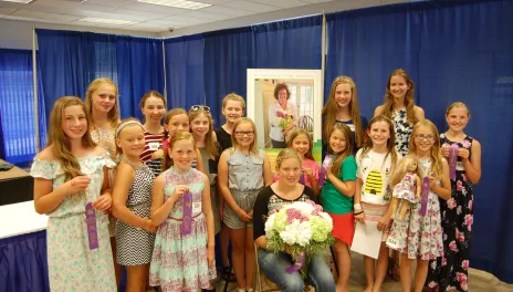 group of girls holding ribbons at state fair 4-H competition