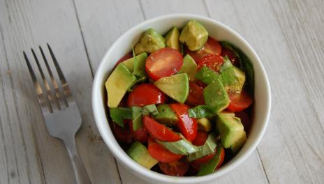 Fresh Tomato, Basil and Avocado Salad, prepared and served in a bowl