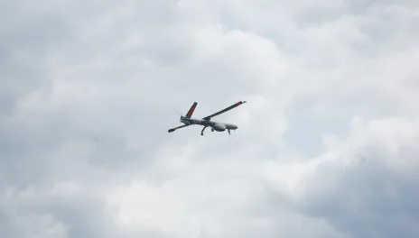 flying drone on cloudy day