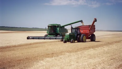 combine harvesting barley