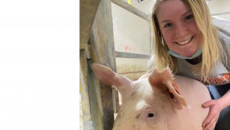 Molly Holt with a pig