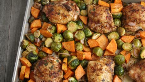 baking pan with chicken, brussel sprouts and sweet potatoes