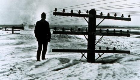 Utility poles nearly completely buried in snow in March of 1966.