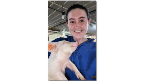 Katherine Mastey with piglet