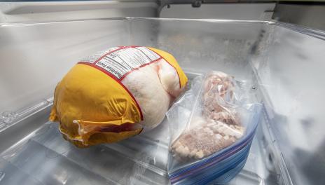 frozen poultry and bacon in  freezer