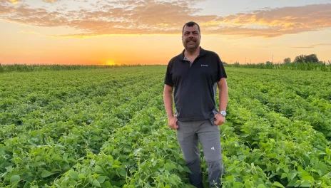 Juan Osorno in a field of beans