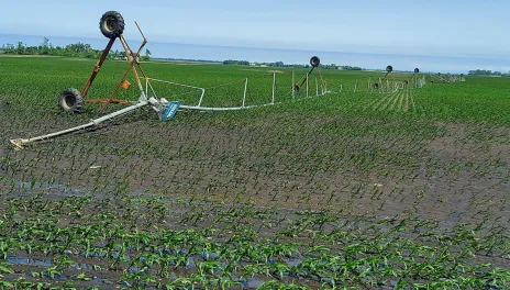overturned field irrigator from a summer storm