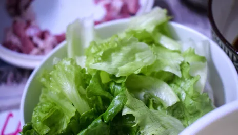 Past cyclosporiasis outbreaks have been associated with leafy greens, bagged salads, herbs and other vegetables. 
