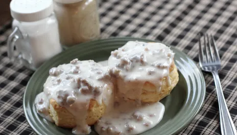 A plate of biscuits and gravy.