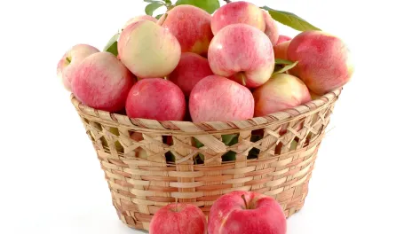 Red apples in a basket.