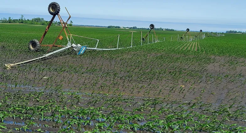 overturned field irrigator from a summer storm