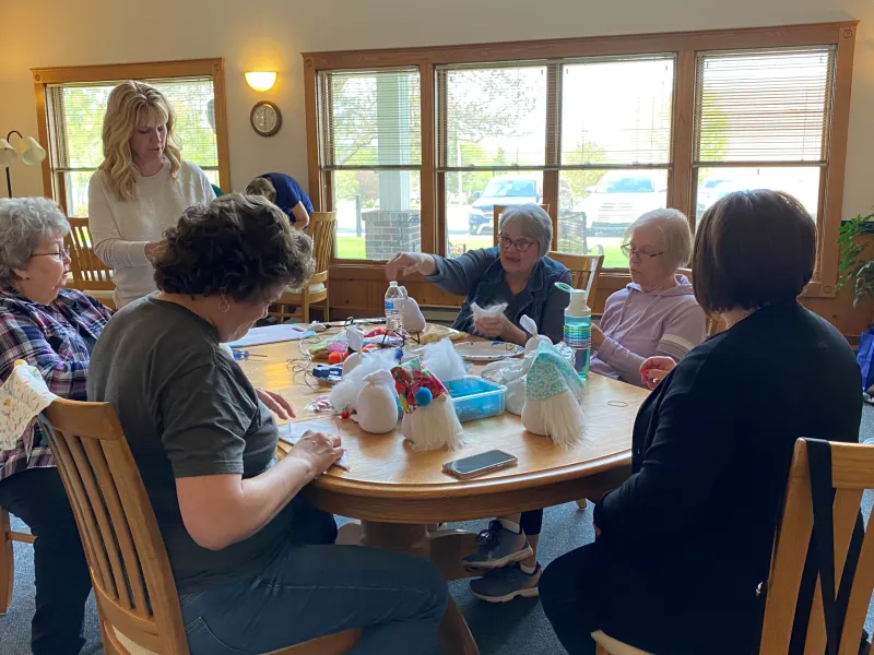 women crafting making gnomes