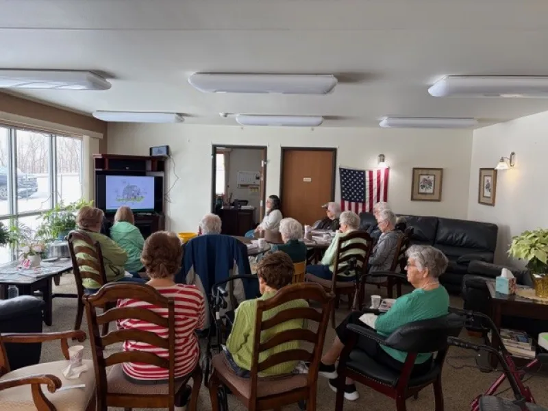 senior citizens listening to a speaker talking about depression in older adults