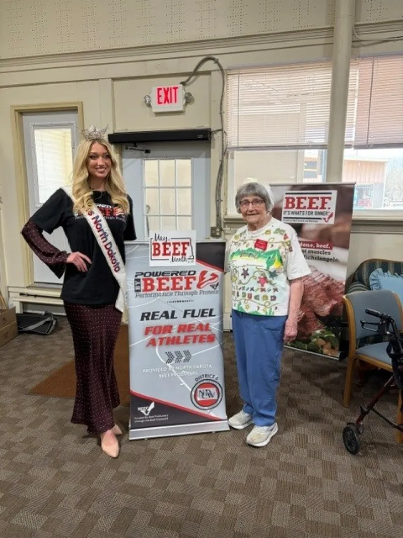 Miss ND poses with the Beef Cook off participant