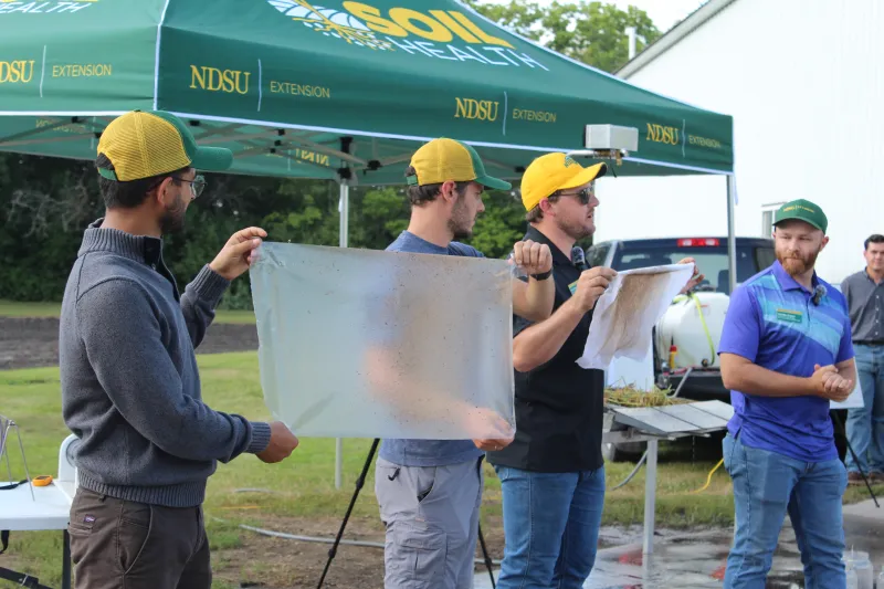 Men doing an ag demo