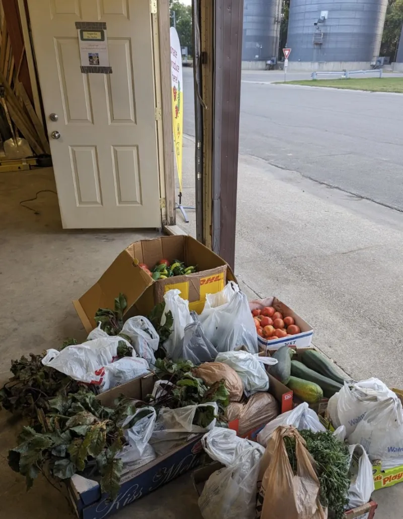 bags of fresh vegetables in a garage