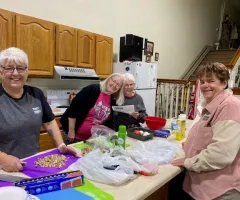 Senior citizens doing healthy food prep