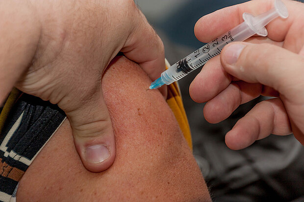 Photo of vaccination shot being given