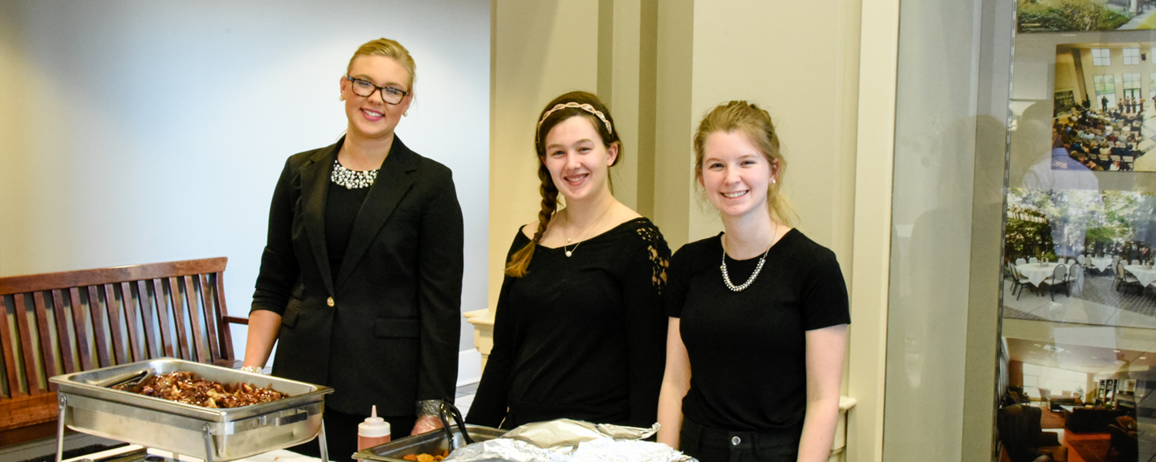 Photo of students hosting the Food and Wine Show
