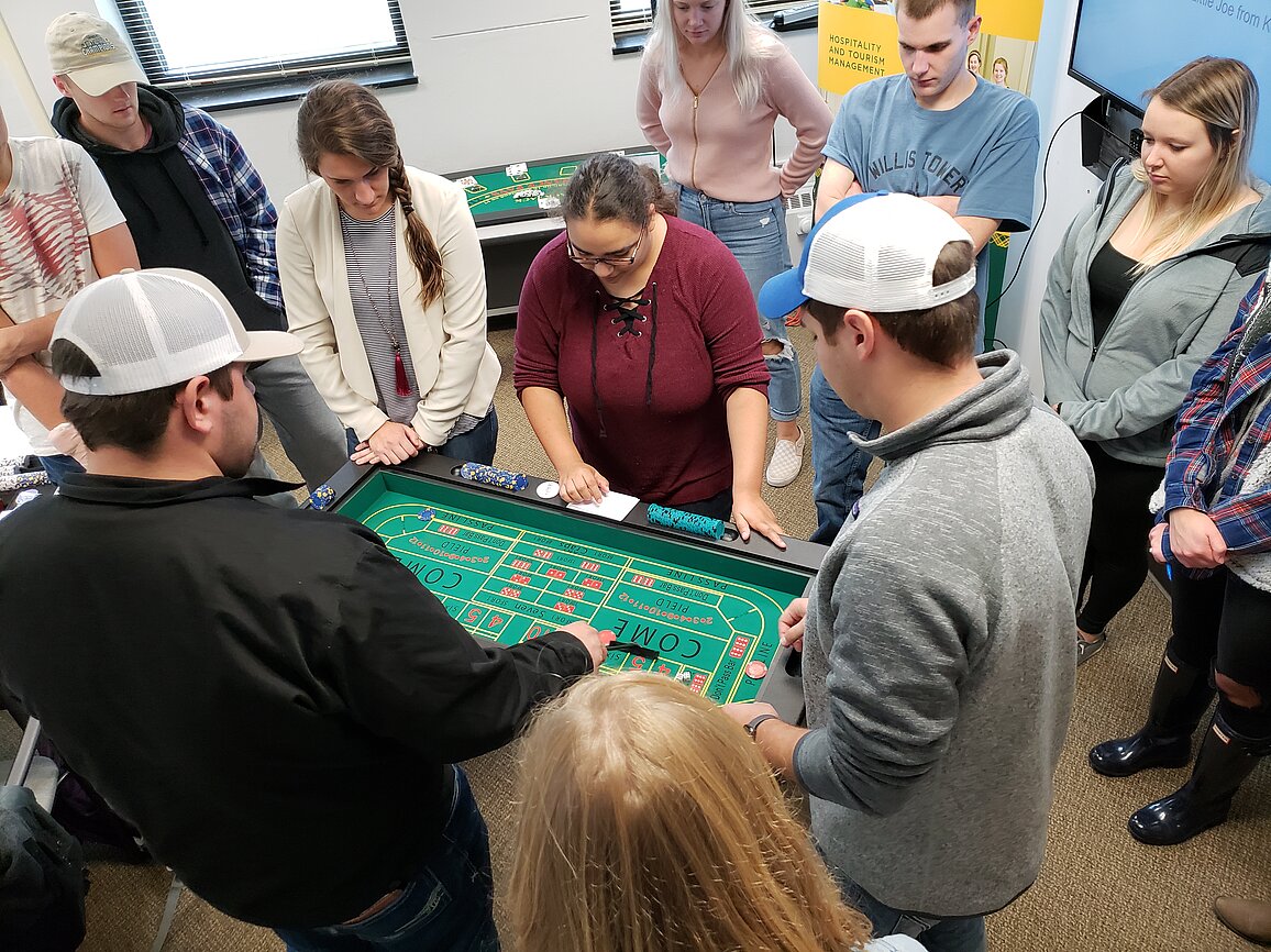 Photo of students demonstrating Craps table