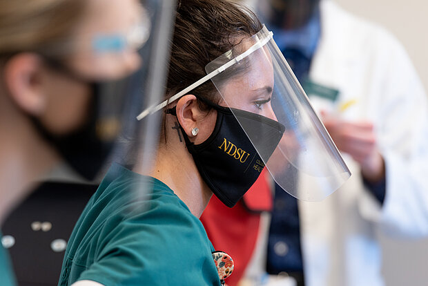 Photo of NDSU Nursing students wearing face shields
