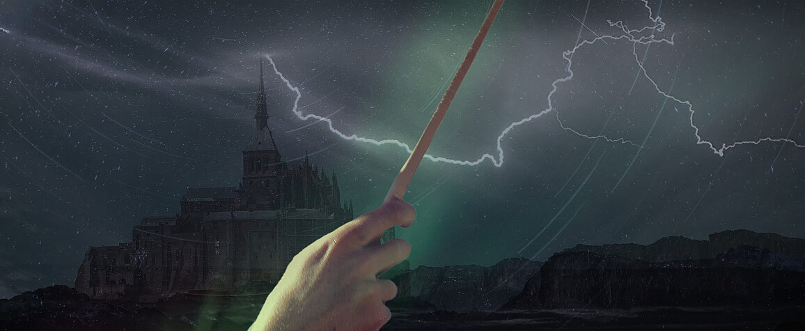 Wizard with wand and lightening in background