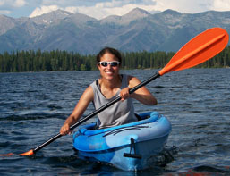 Amy kayaking on Lindberg Lake, not too far from her former home in Seeley Lake, MT.