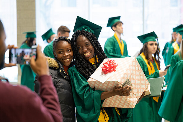 Winter Commencement Student with Gift