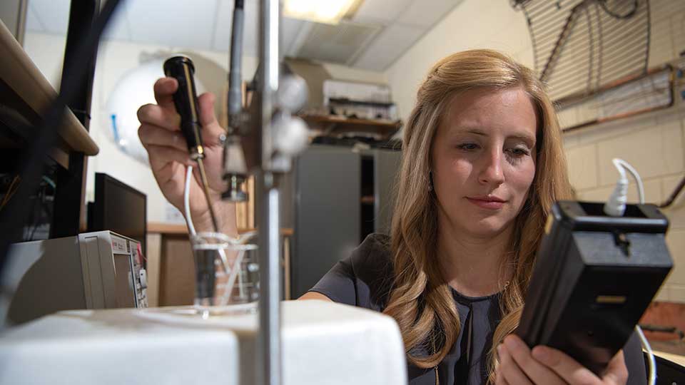 ndsu graduate student doing electronics testing