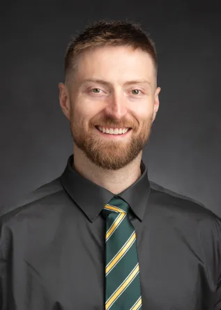 Ian smiling at the camera