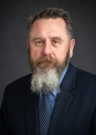 Mark Nawrot looking confidently at camera. 