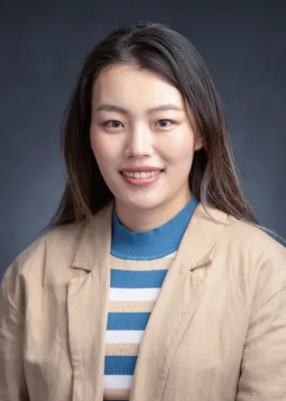 Emily smiling at the camera.