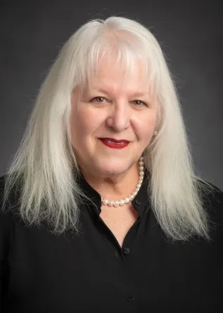 Elizabeth Reilly looking confidently at camera. 