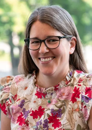 Jill Lodde-Greives smiling confidently at camera.