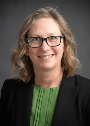 Kendra Greenlee smiling confidently.