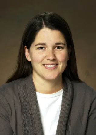 Jill Lodde-Greives smiling confidently.