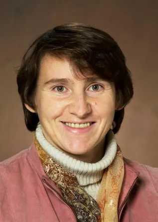 Svetlana Kilina smiling confidently at the camera