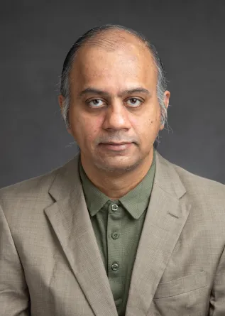 Hariharaputhiran Subramanian smiling confidently at the camera